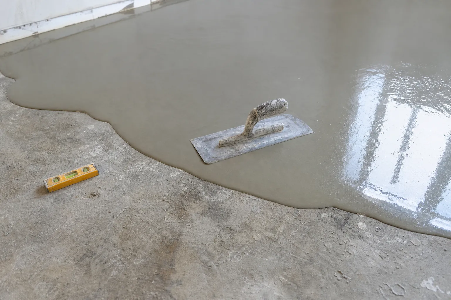 Ragréage d’un support en béton avant pose de carrelage